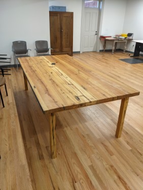 angled view of endgrain of assembled table in office